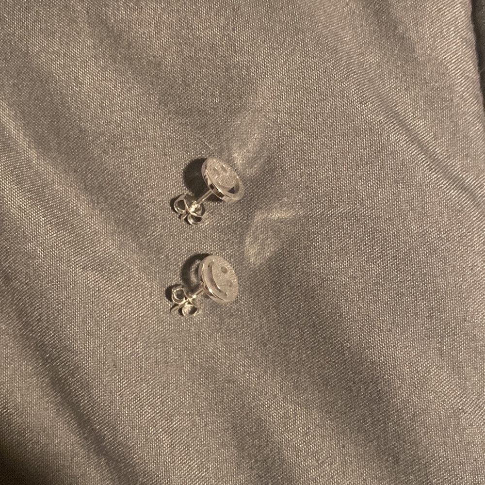 Never worn smiley face earrings
